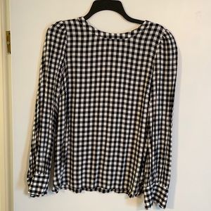 Buffalo plaid blouse.